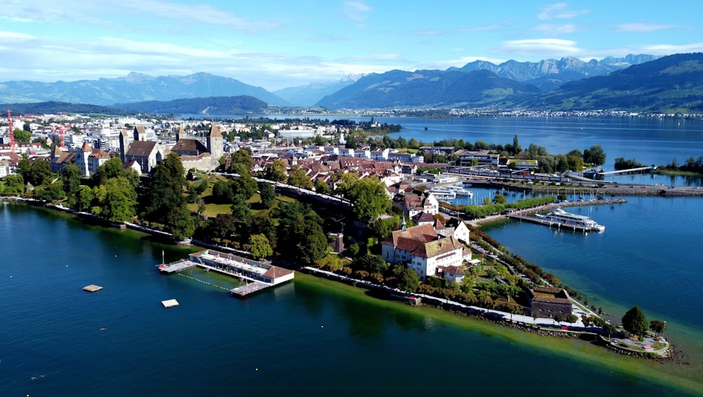 aerial view of city near body of water during daytime