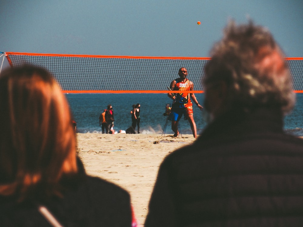 people on beach during daytime