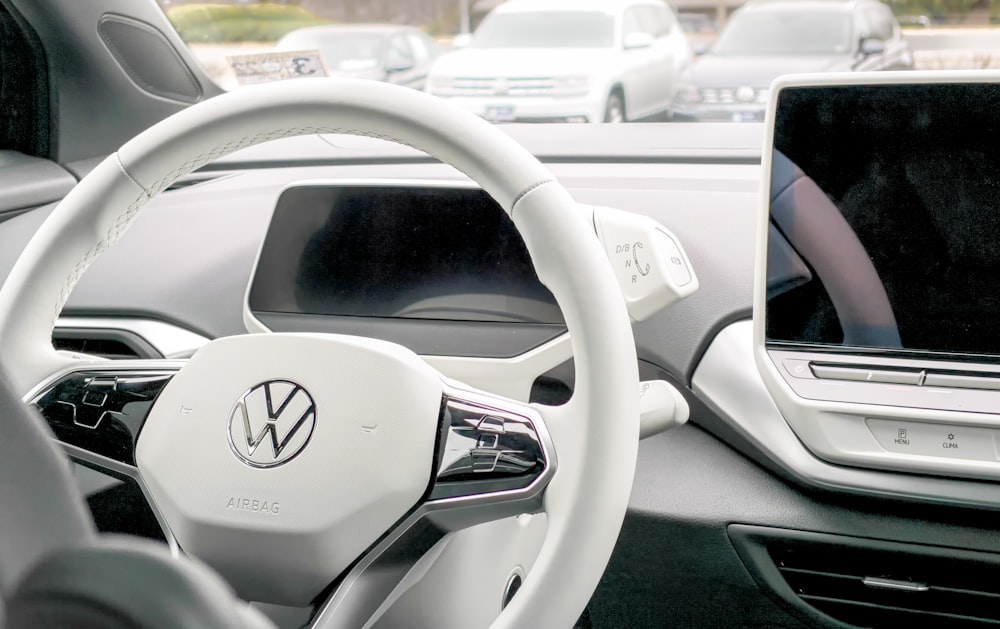 black and silver mercedes benz steering wheel