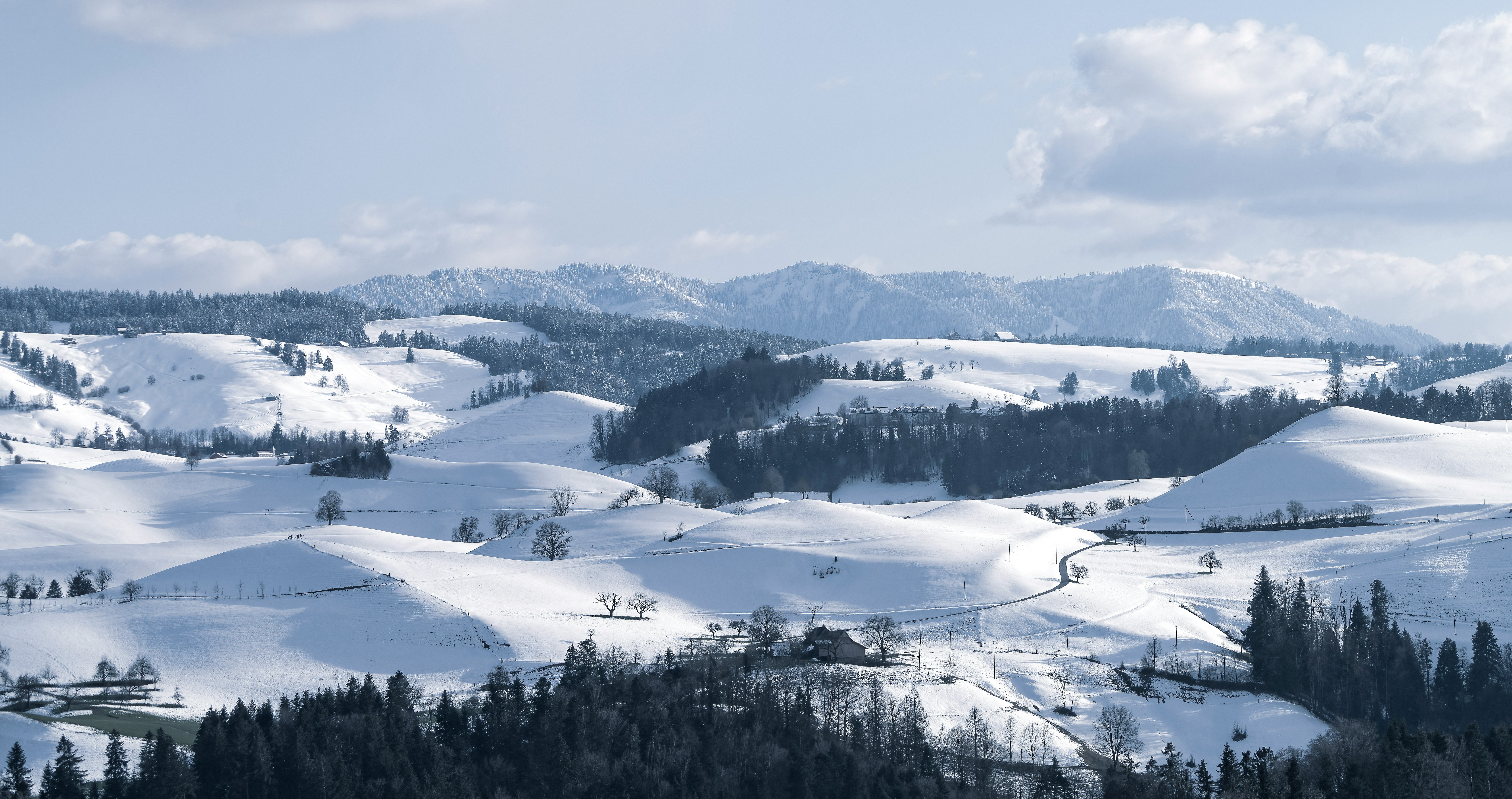 snow covered mountain during daytime