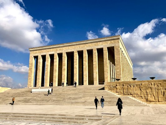 People walking near brown concrete building during daytime — Ankara, Turkey