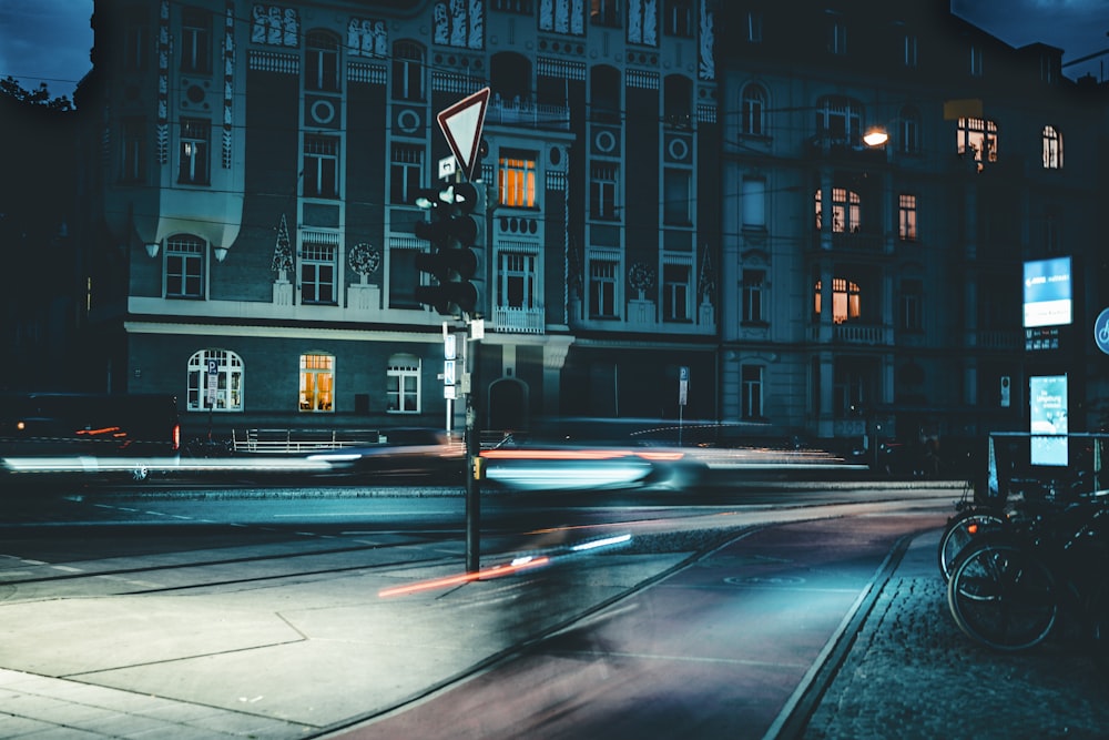 black and white pedestrian lane during night time