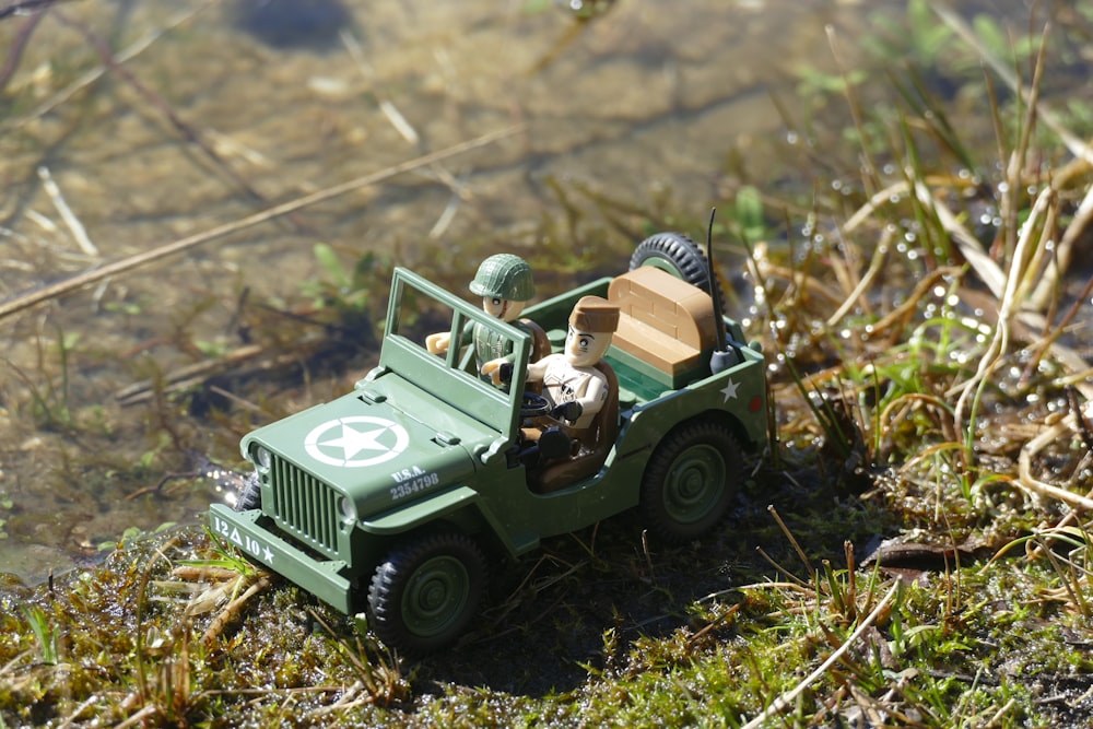 green and white jeep wrangler scale model