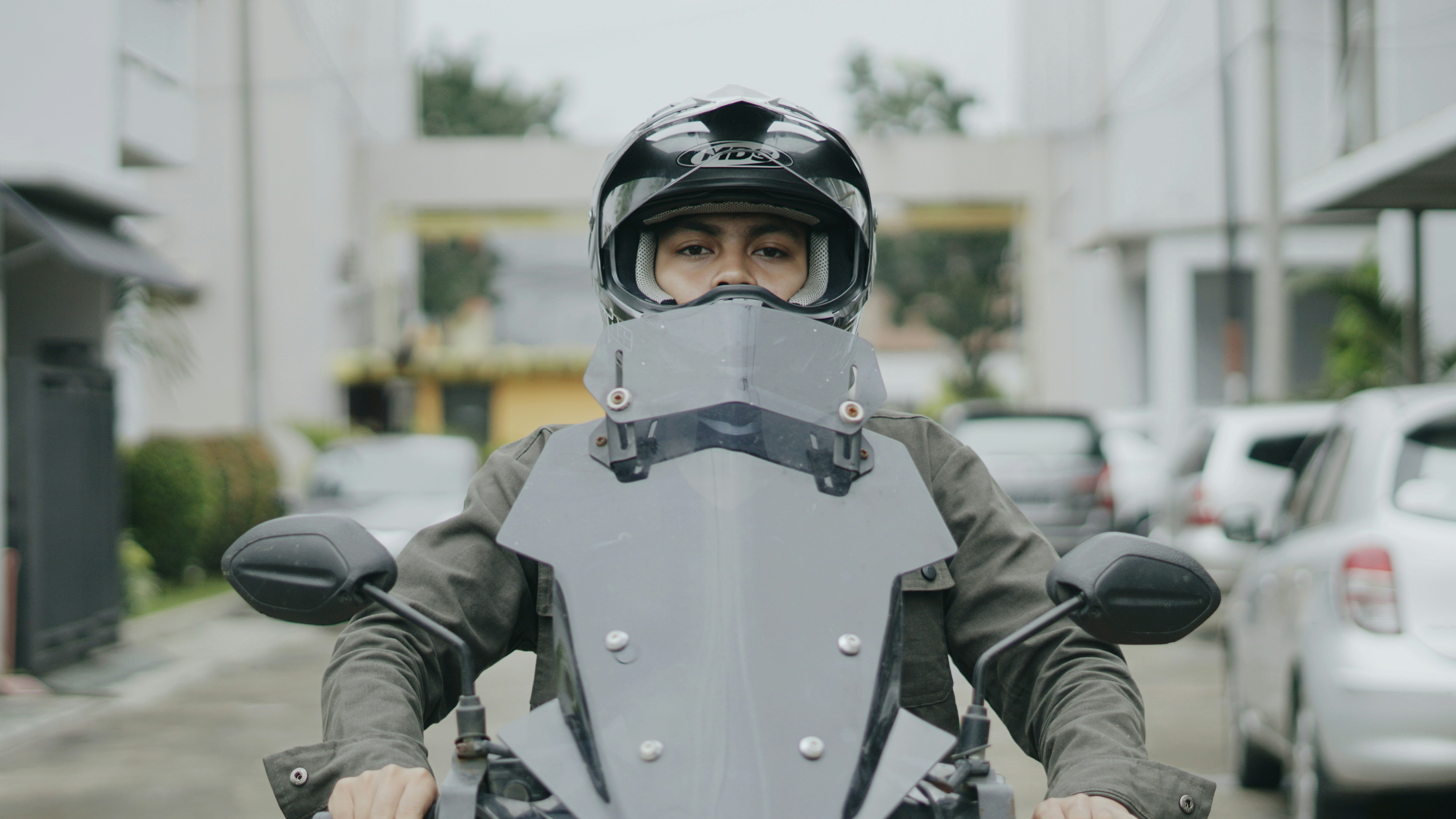 person in black and white helmet and black jacket