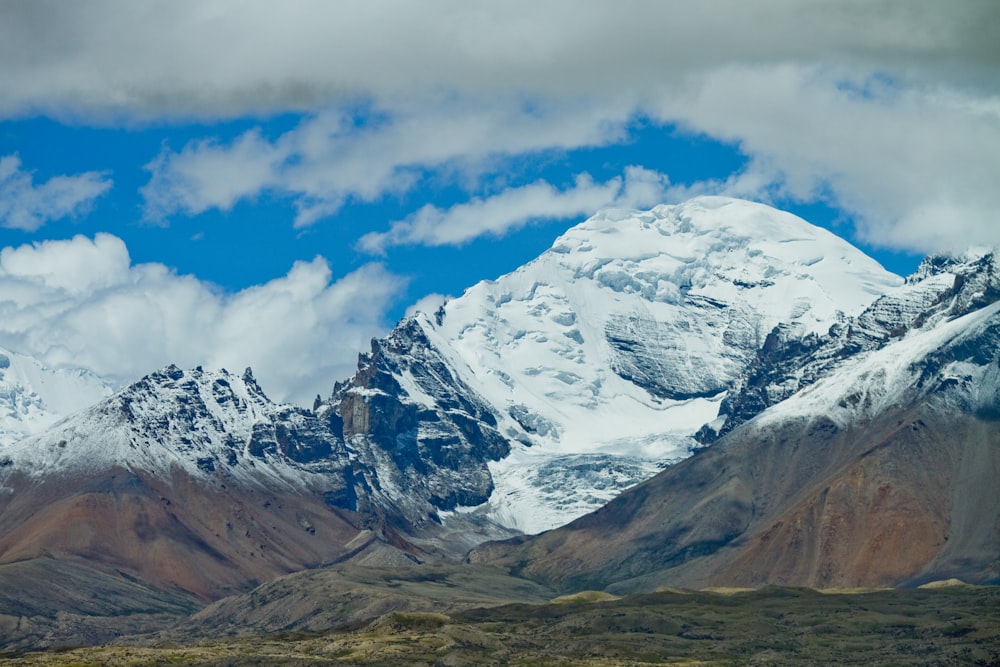 snow covered mountain under blue sky during daytime