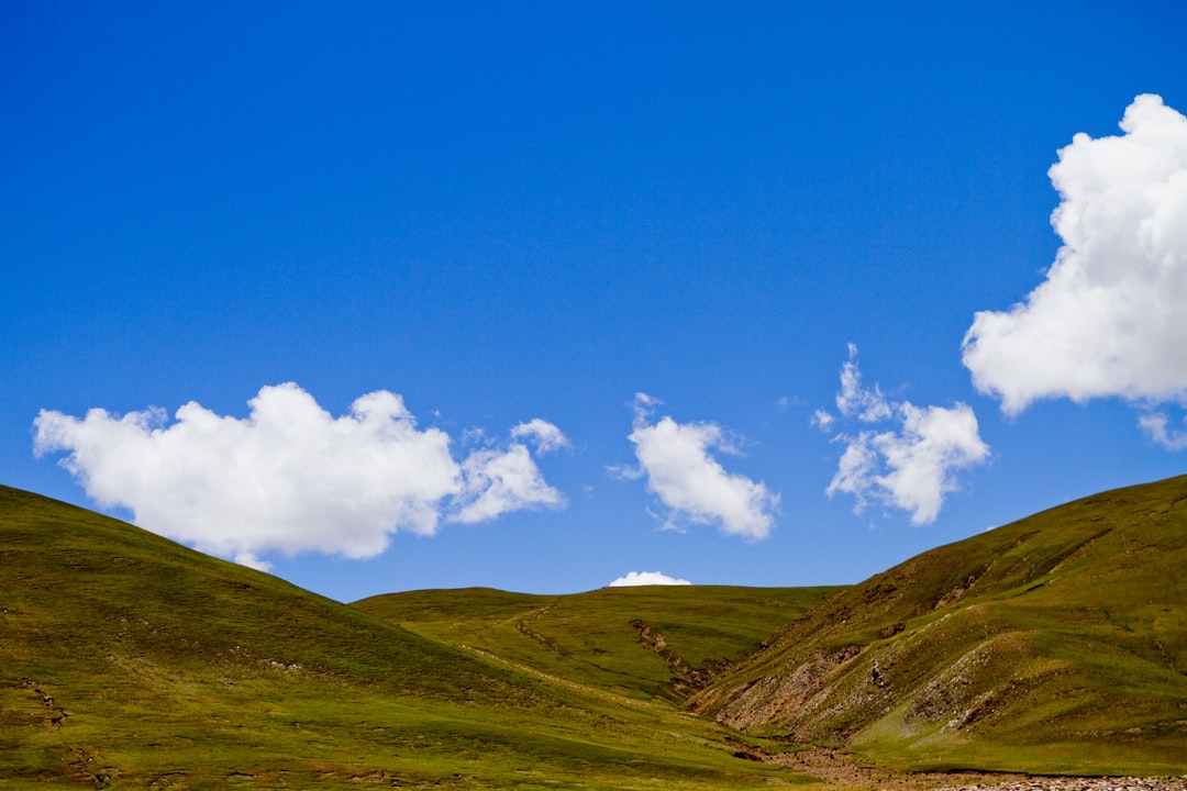 green mountain under blue sky during daytime