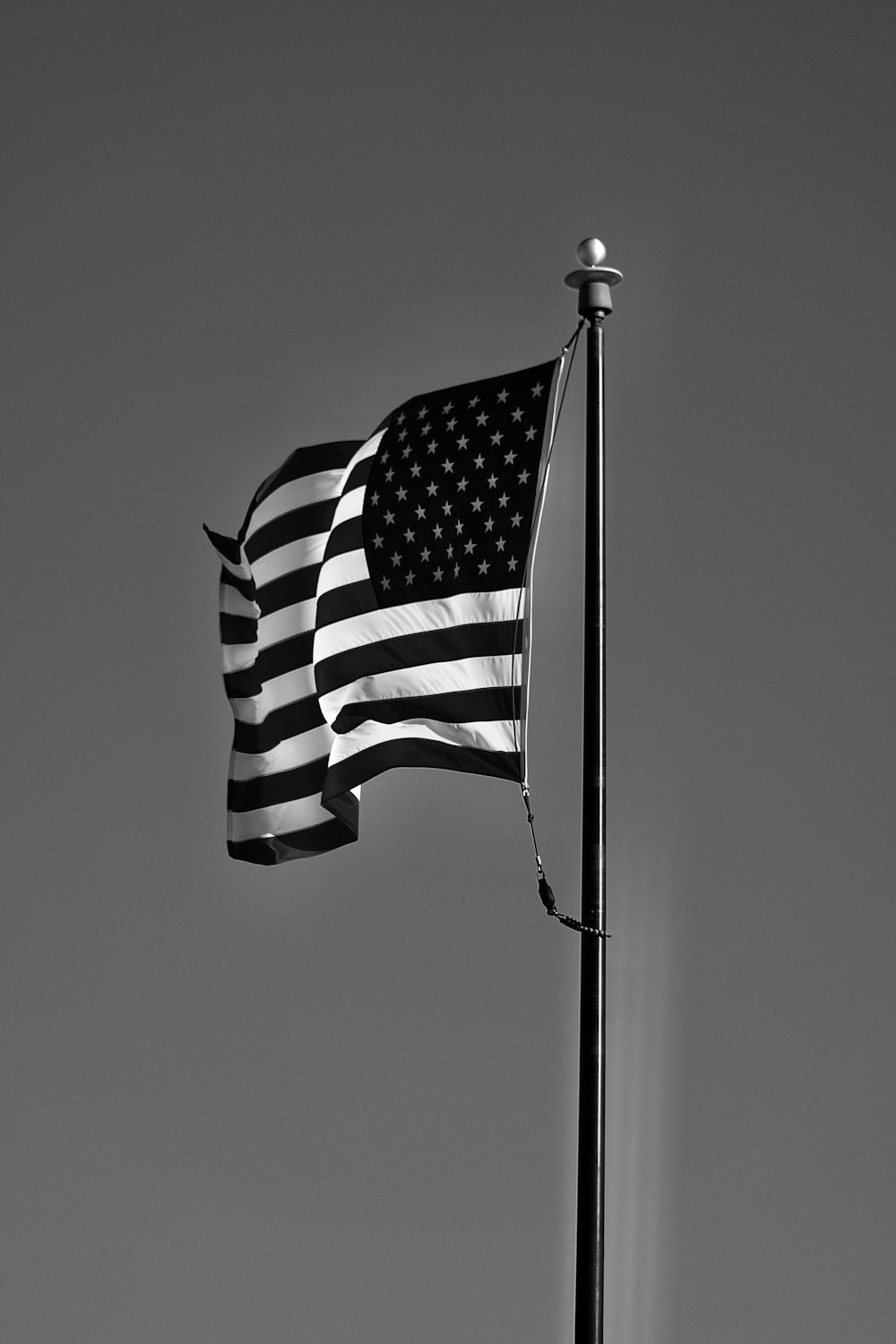 grayscale photo of us a flag