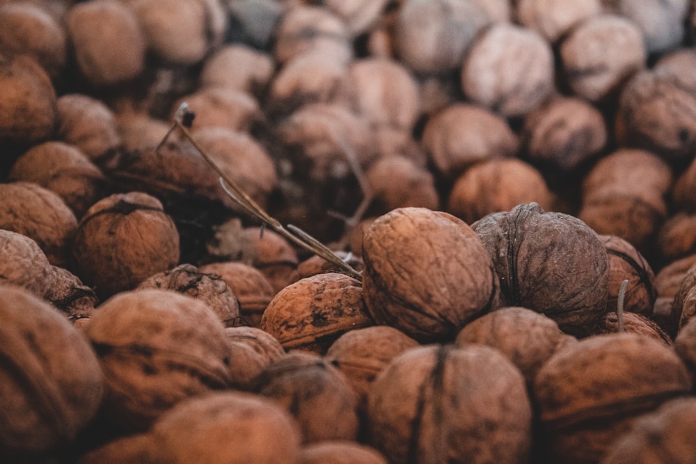 brown round fruits on brown wooden table