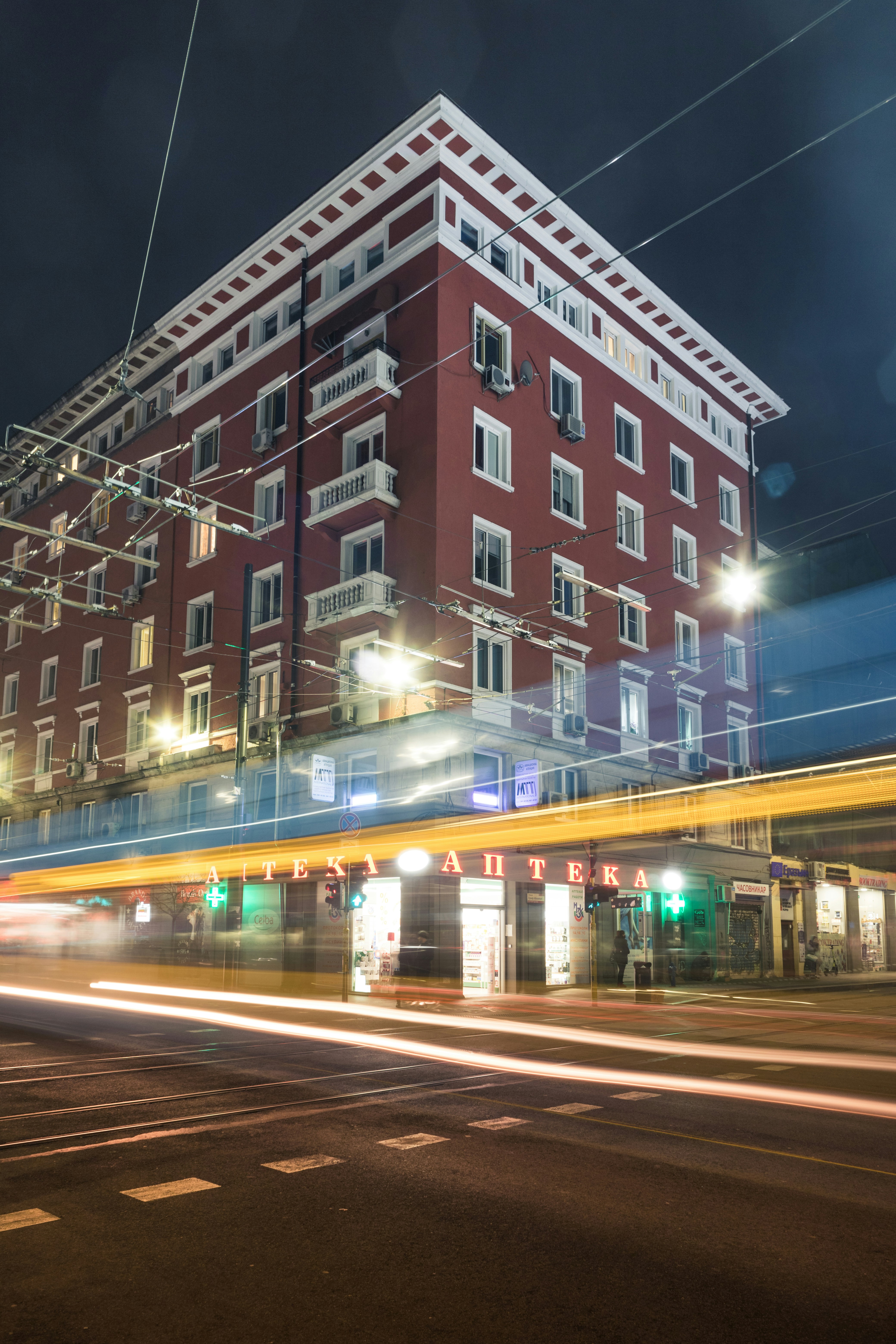 red and white concrete building during night time