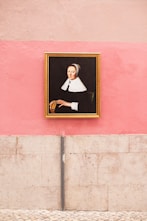 woman in black and white school uniform painting