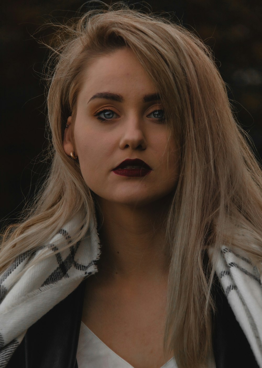 woman in white and black scarf