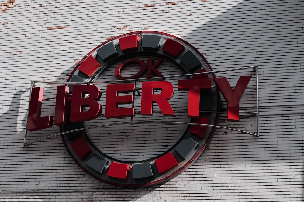 a sign on the side of a building that says liberty