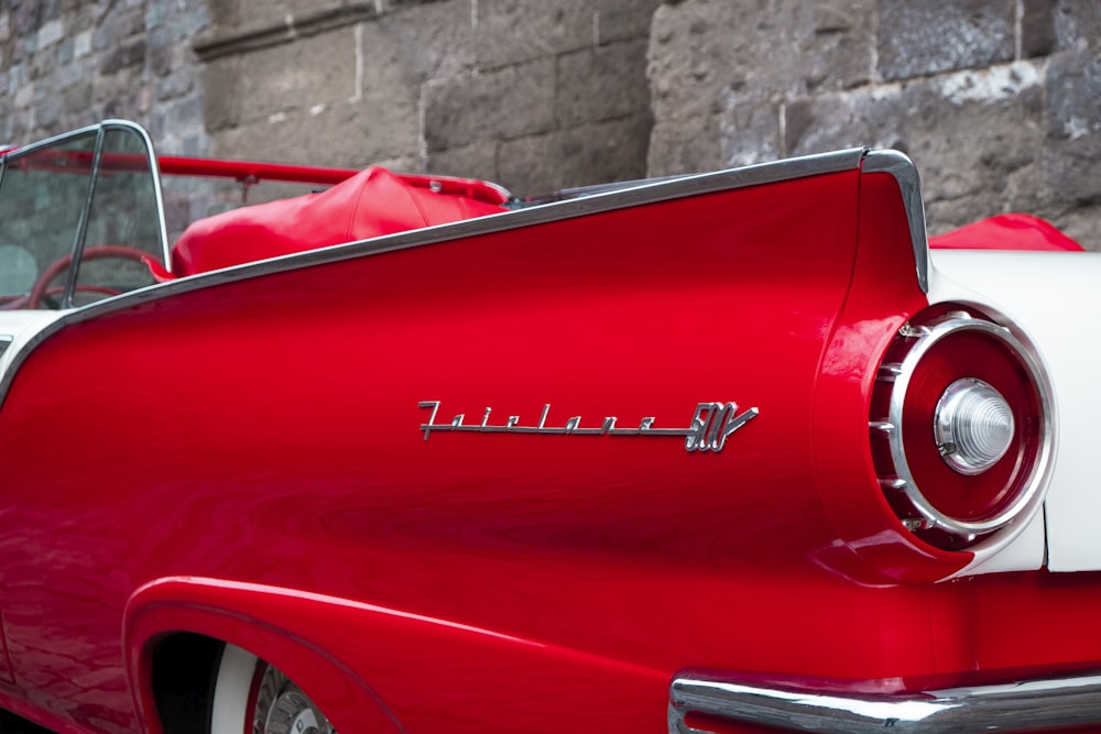 red car with white textile on top