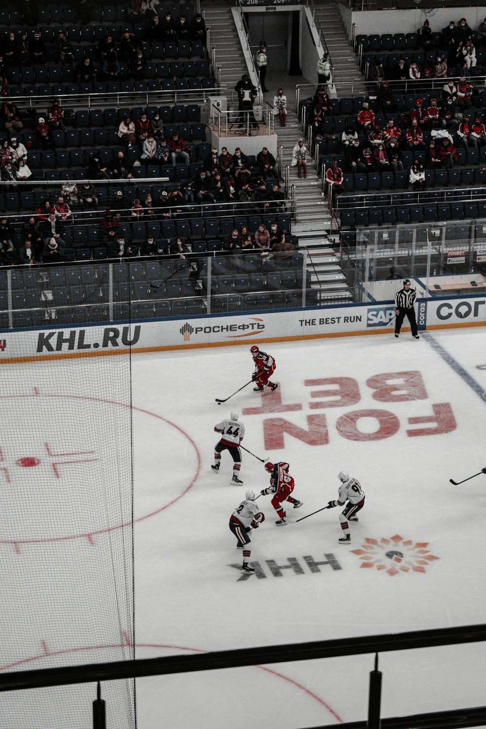 ice hockey players on ice hockey stadium