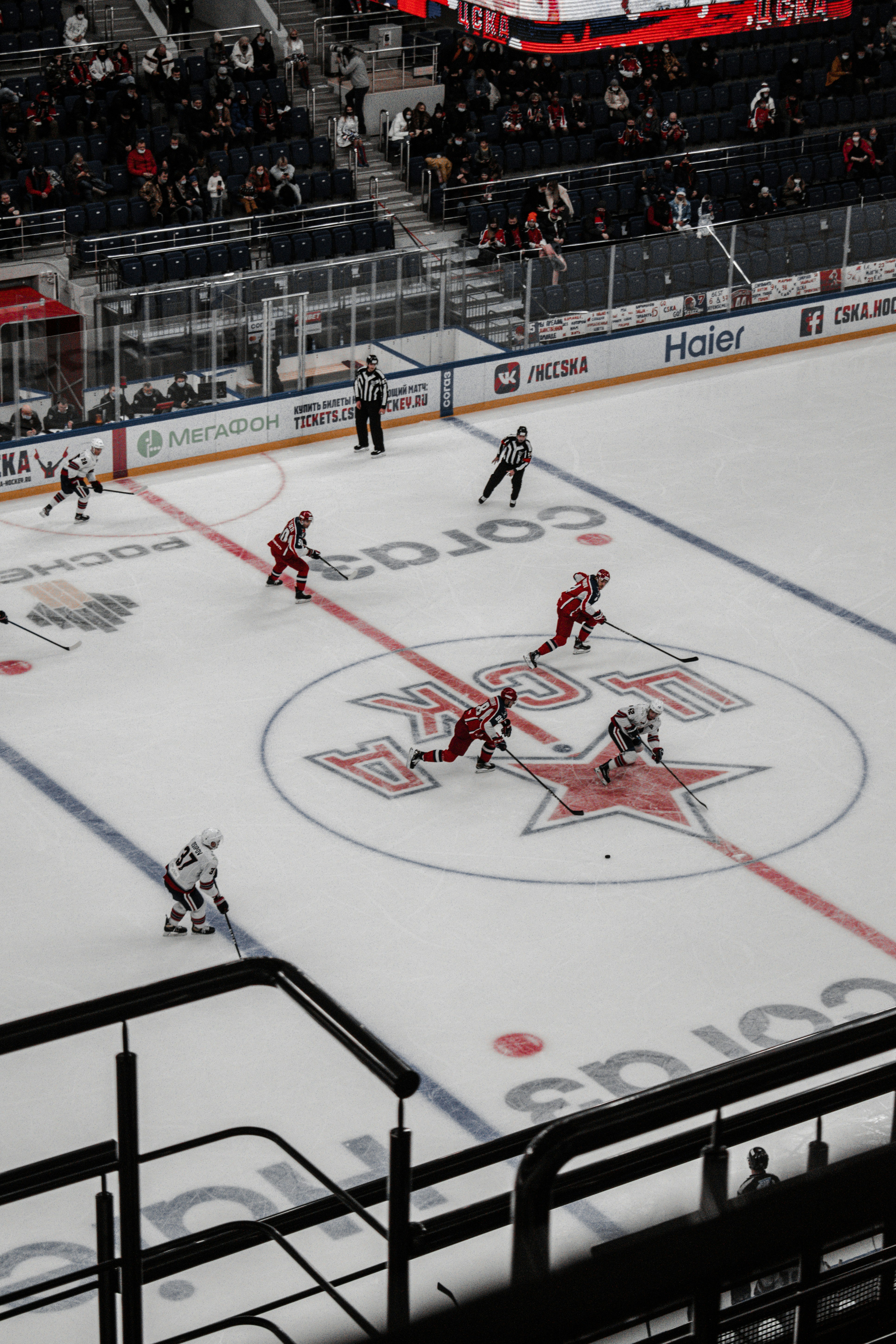 Ice hockey players on ice hockey field photo Free Grey Image on Unsplash