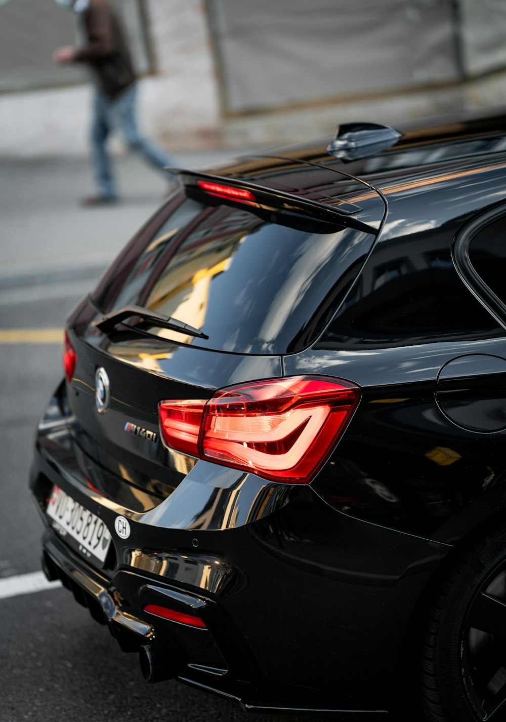 black car on road during daytime