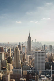 city skyline under blue sky during daytime