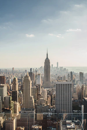city skyline under blue sky during daytime