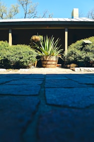 Ground-level photo tour snapshot featuring a spacious property entrance.