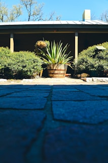 Ground-level photo tour snapshot featuring a spacious property entrance.