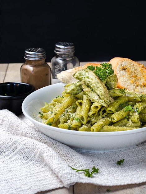 white ceramic bowl with green vegetable dish