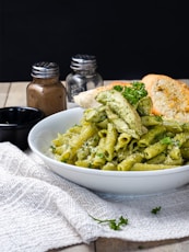 white ceramic bowl with green vegetable dish