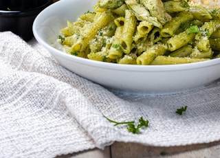 white ceramic bowl with green vegetable dish