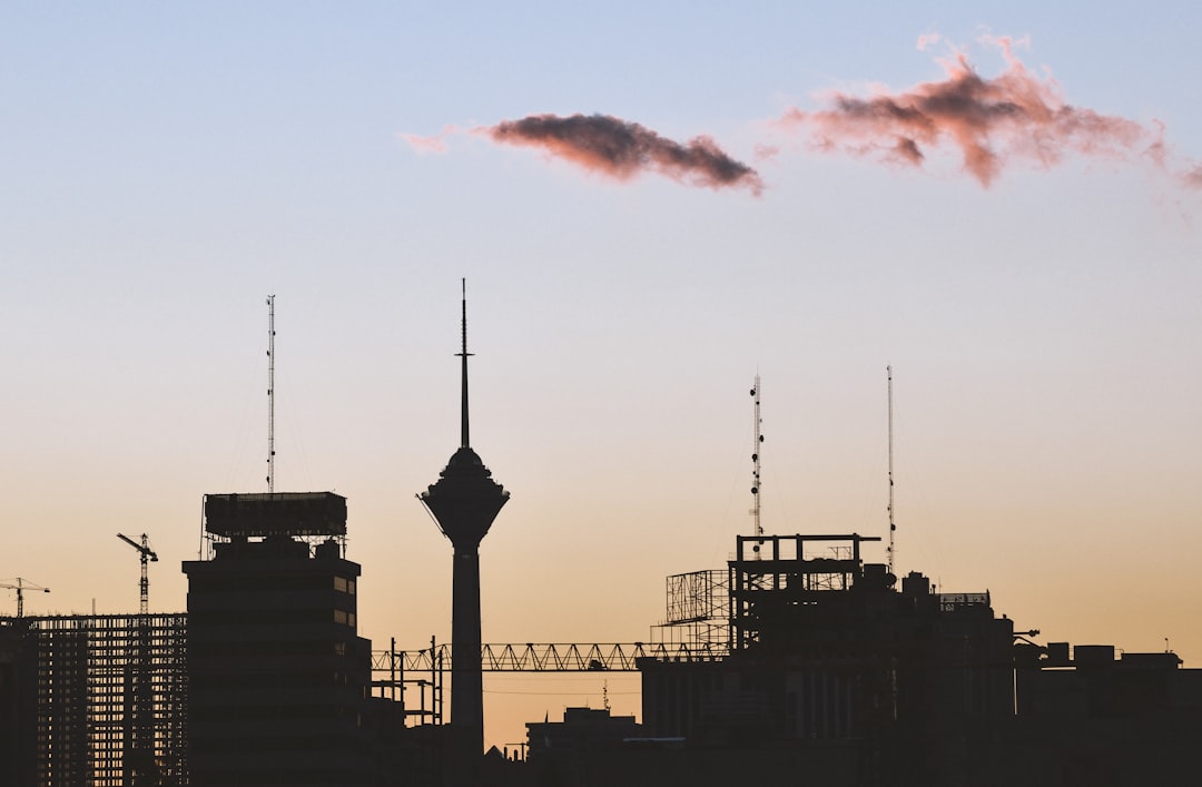 silhouette of building during sunset