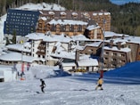 people walking on snow covered field during daytime