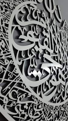 Elegant gold-plated customized necklace with Arabic calligraphy in delicate script.