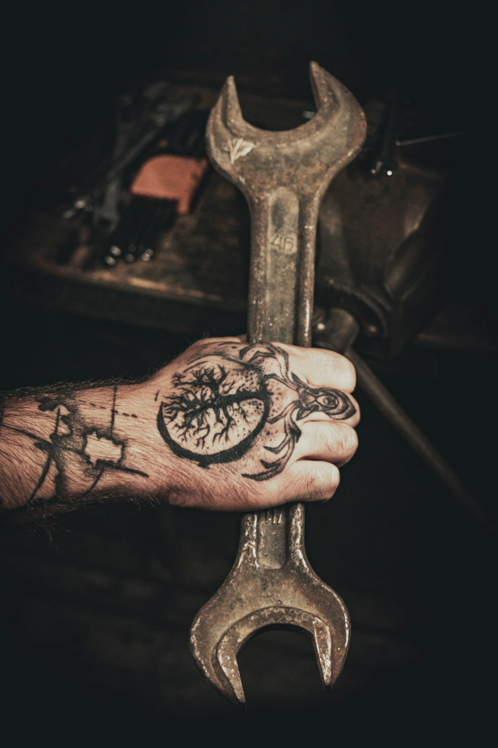 person holding silver skeleton key