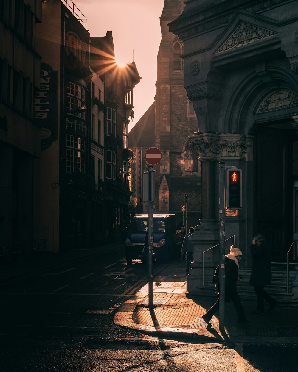 people walking on sidewalk during daytime