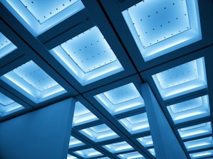 white ceiling with glass windows