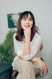 woman in white long sleeve shirt
