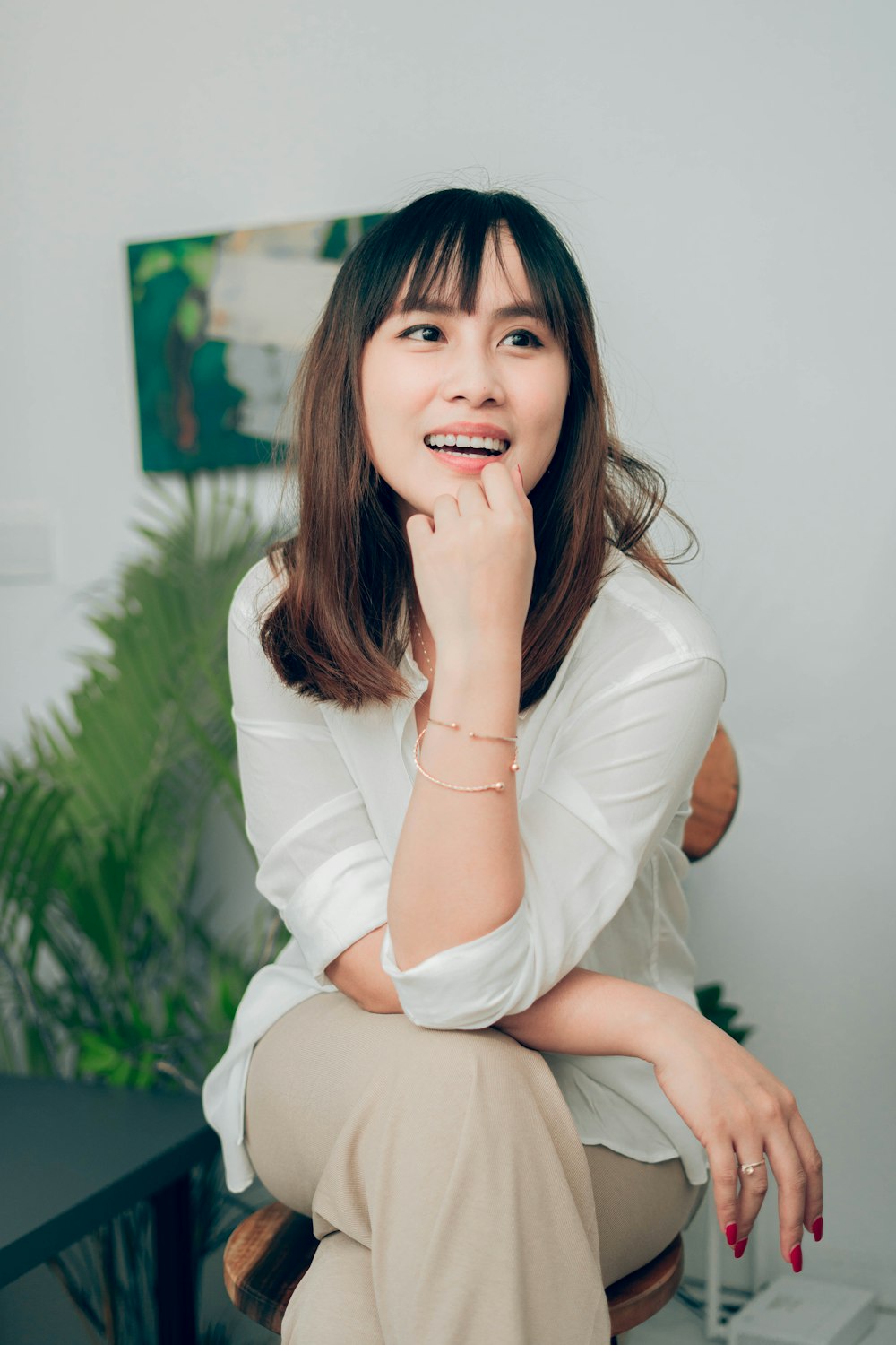 woman in white long sleeve shirt