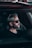 man in black crew neck shirt wearing black sunglasses