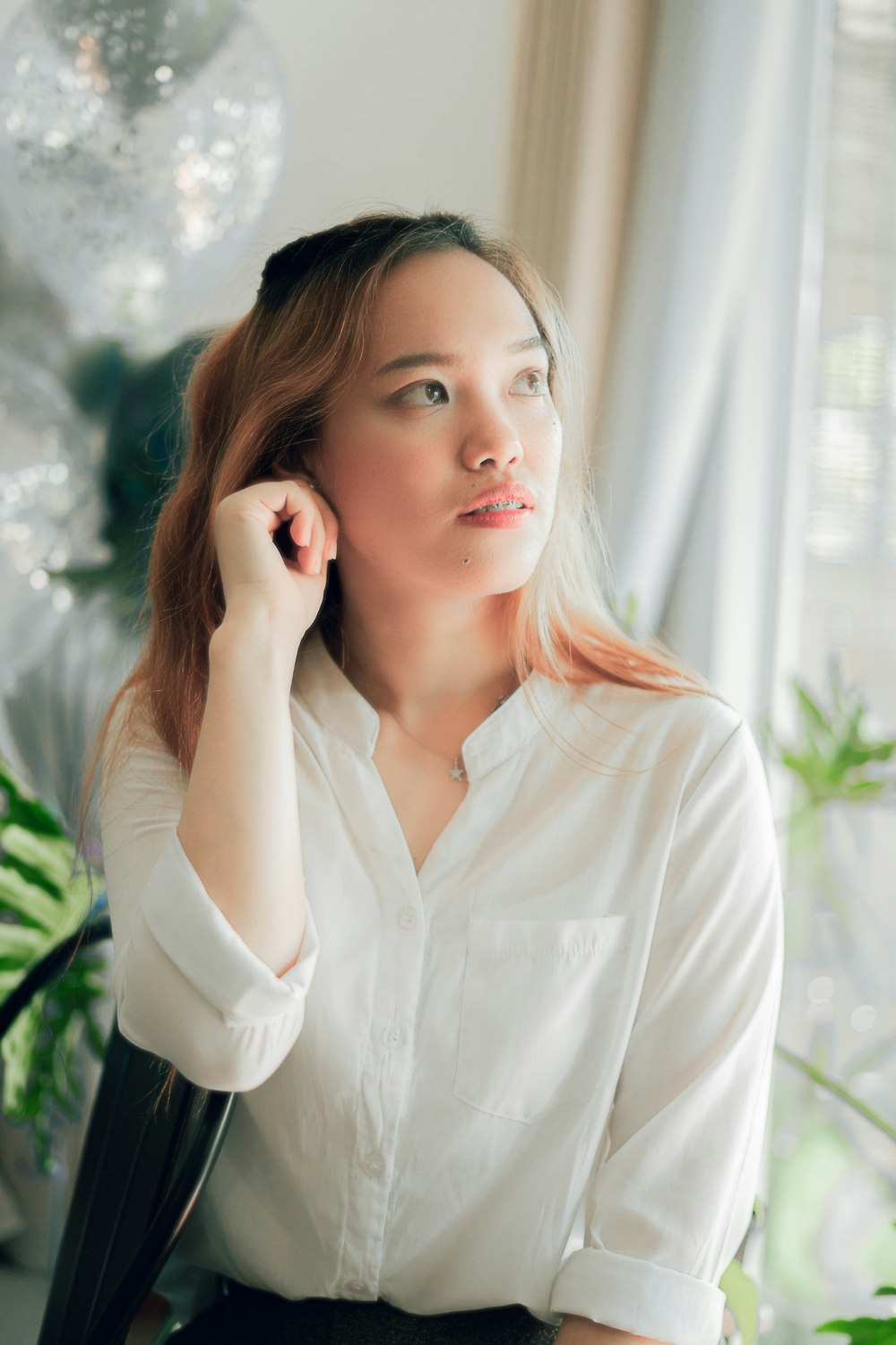 woman in white dress shirt