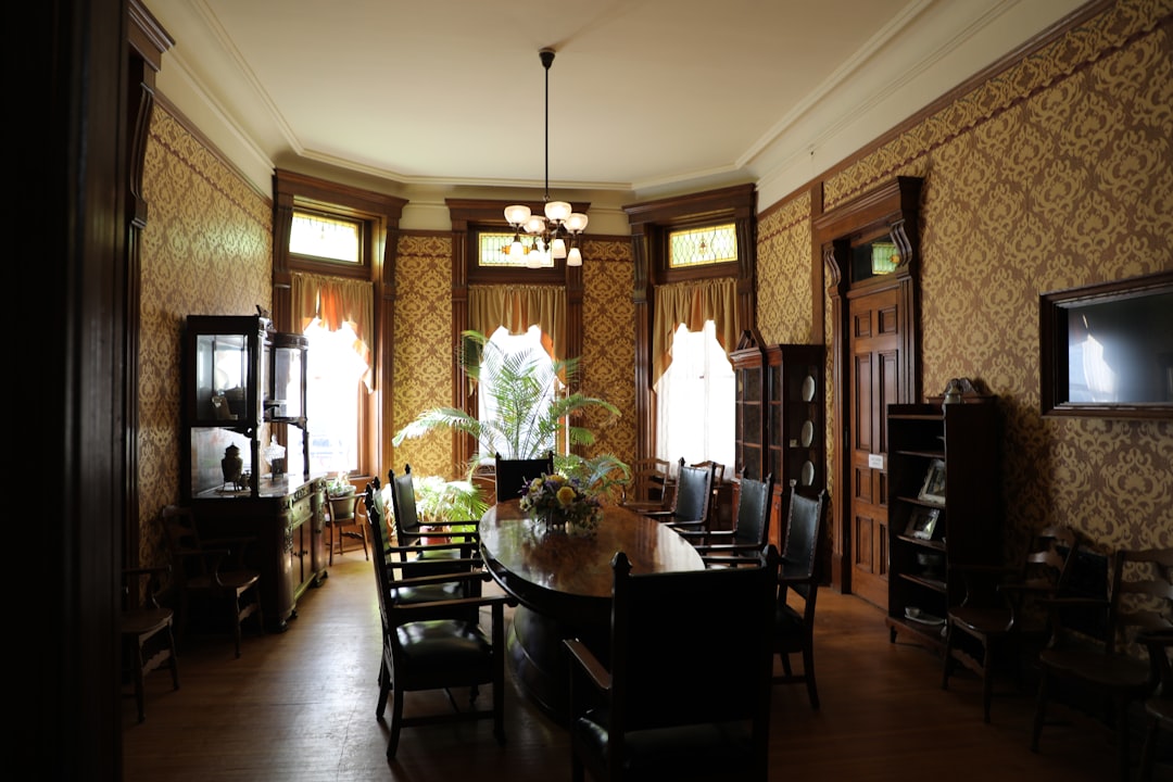 brown wooden dining table and chairs