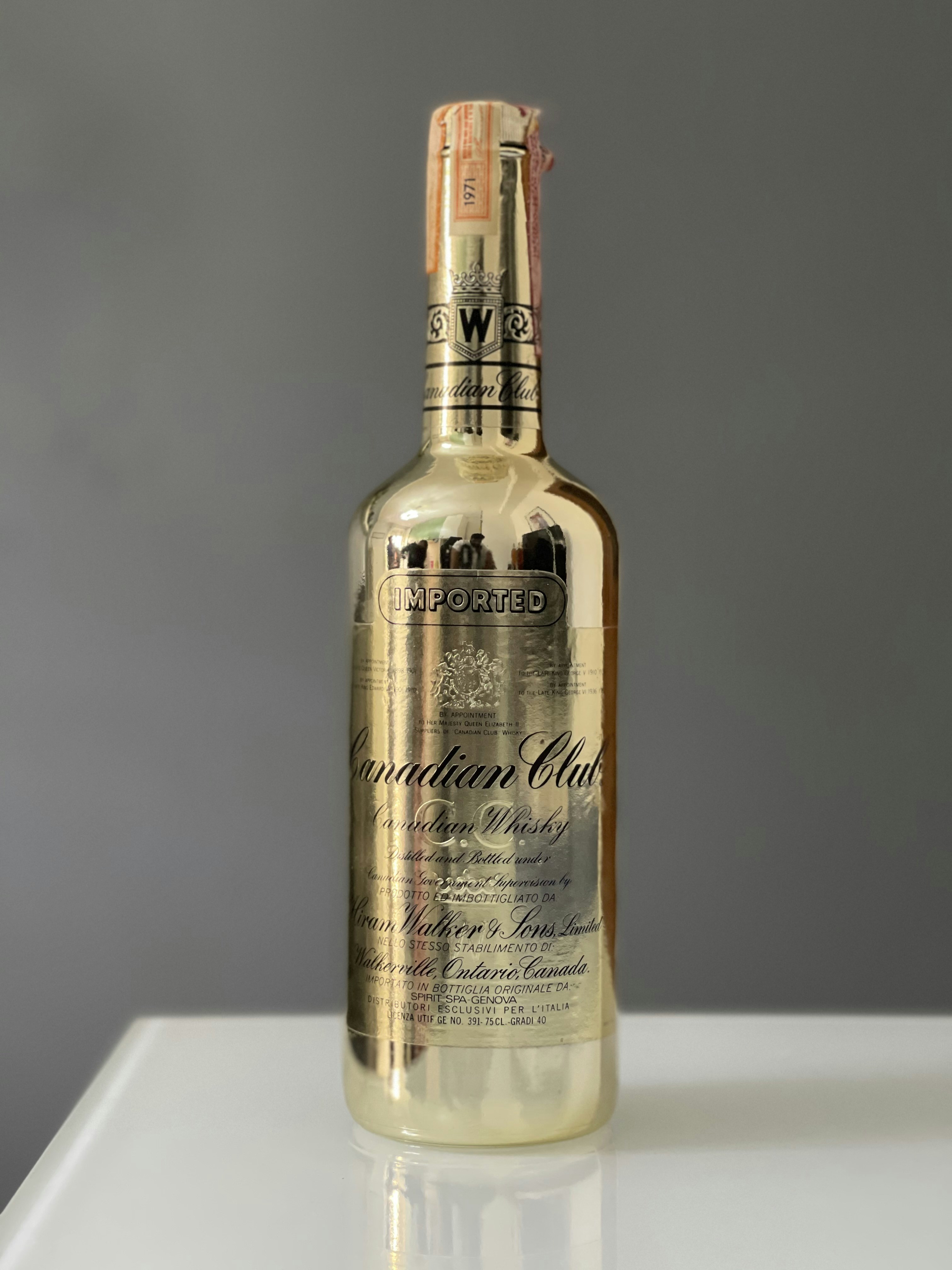 Premium Canadian whisky bottles with warm amber tones