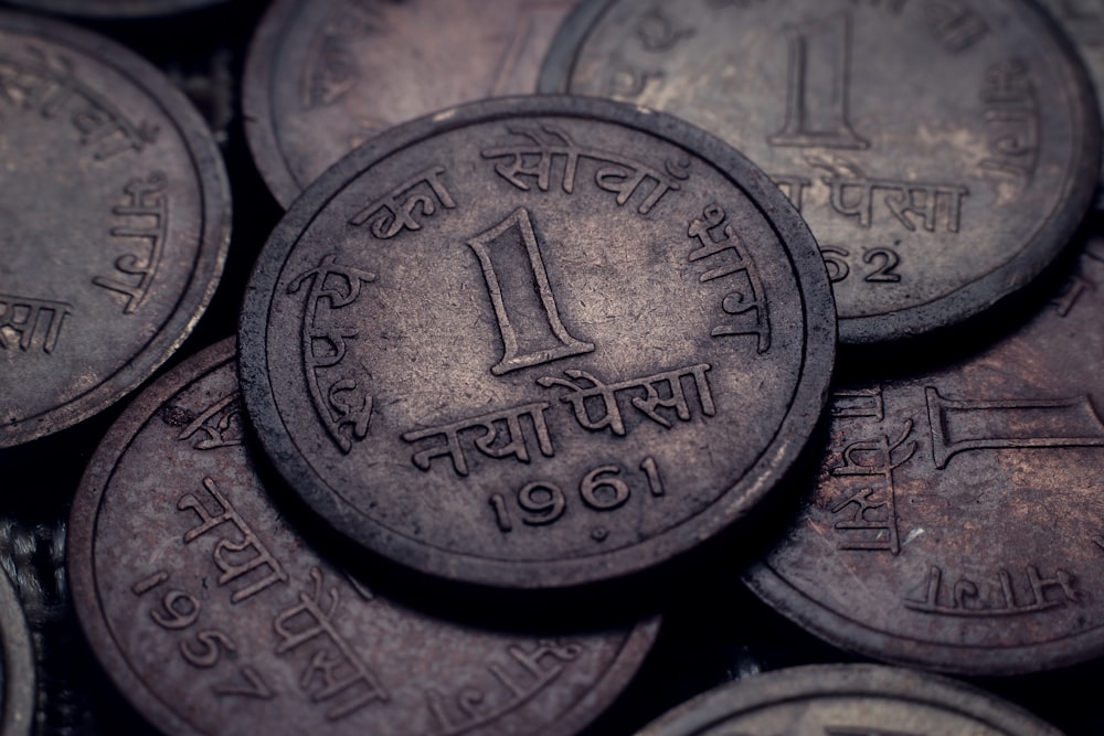 close up photo of round silver coin