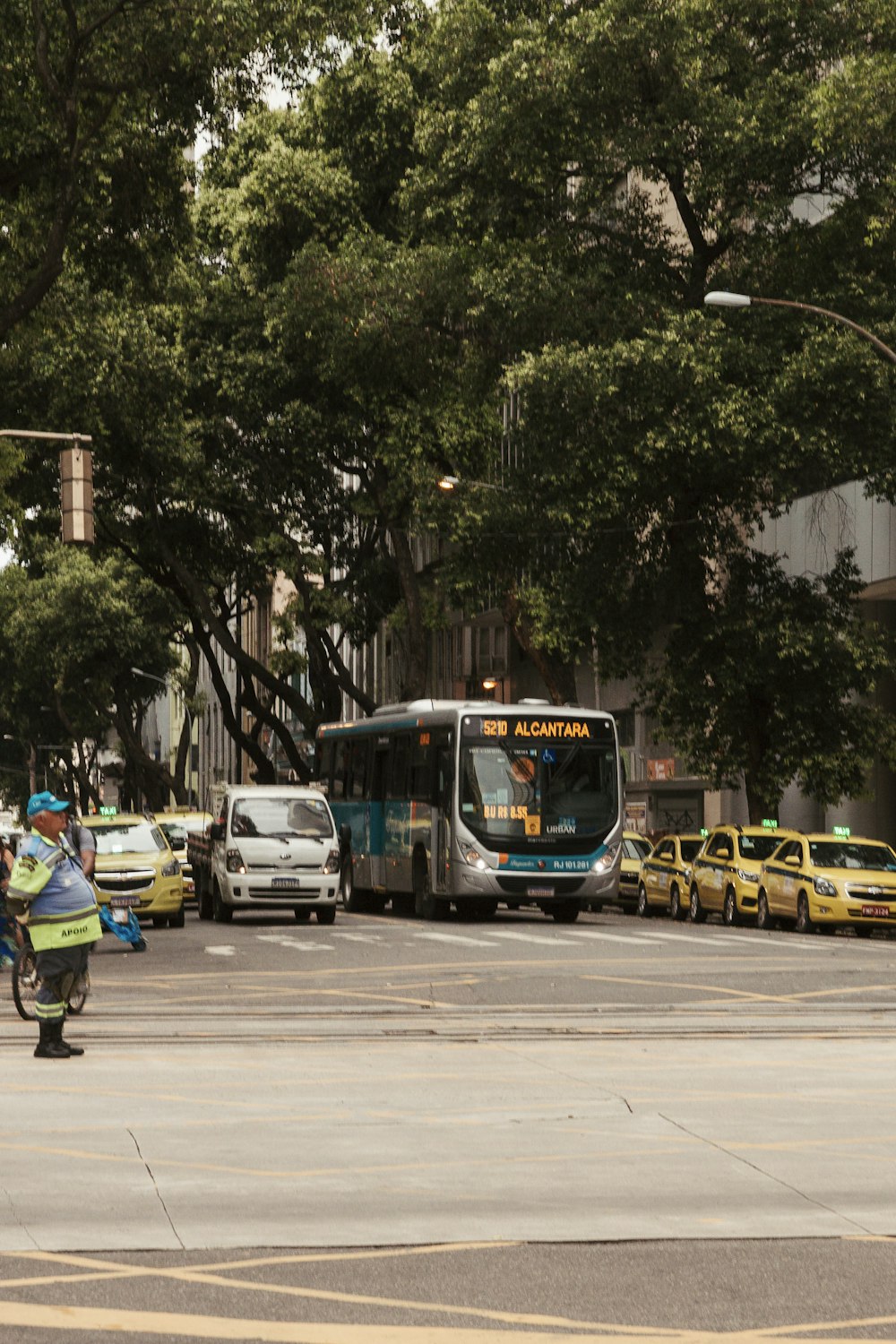 people riding bicycle on road during daytime