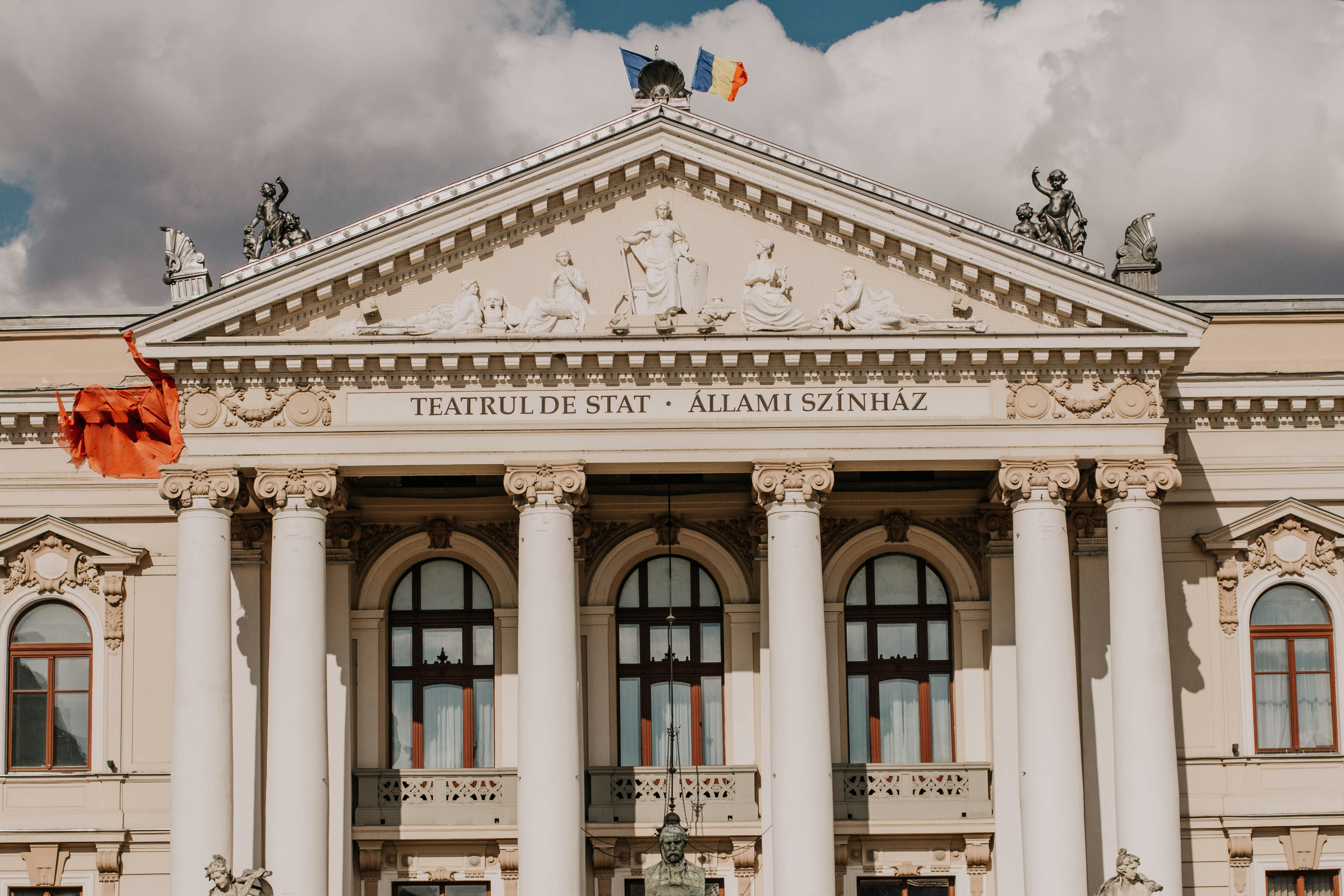 white concrete building under blue sky during daytime