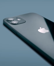 silver iphone 6 on blue surface