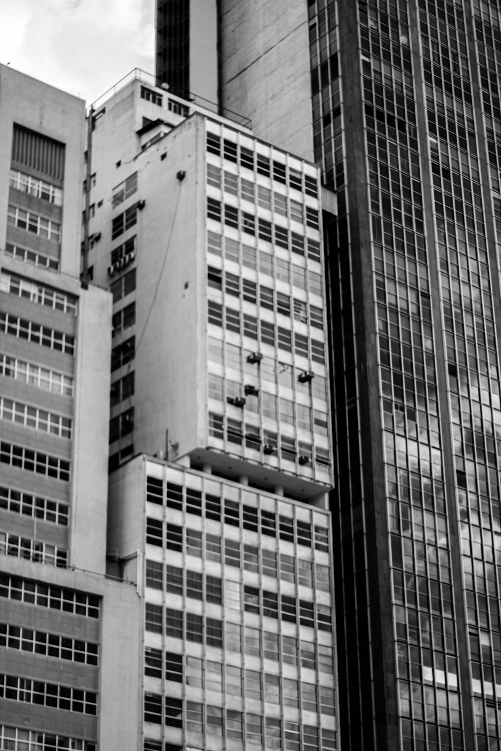 grayscale photo of high rise building