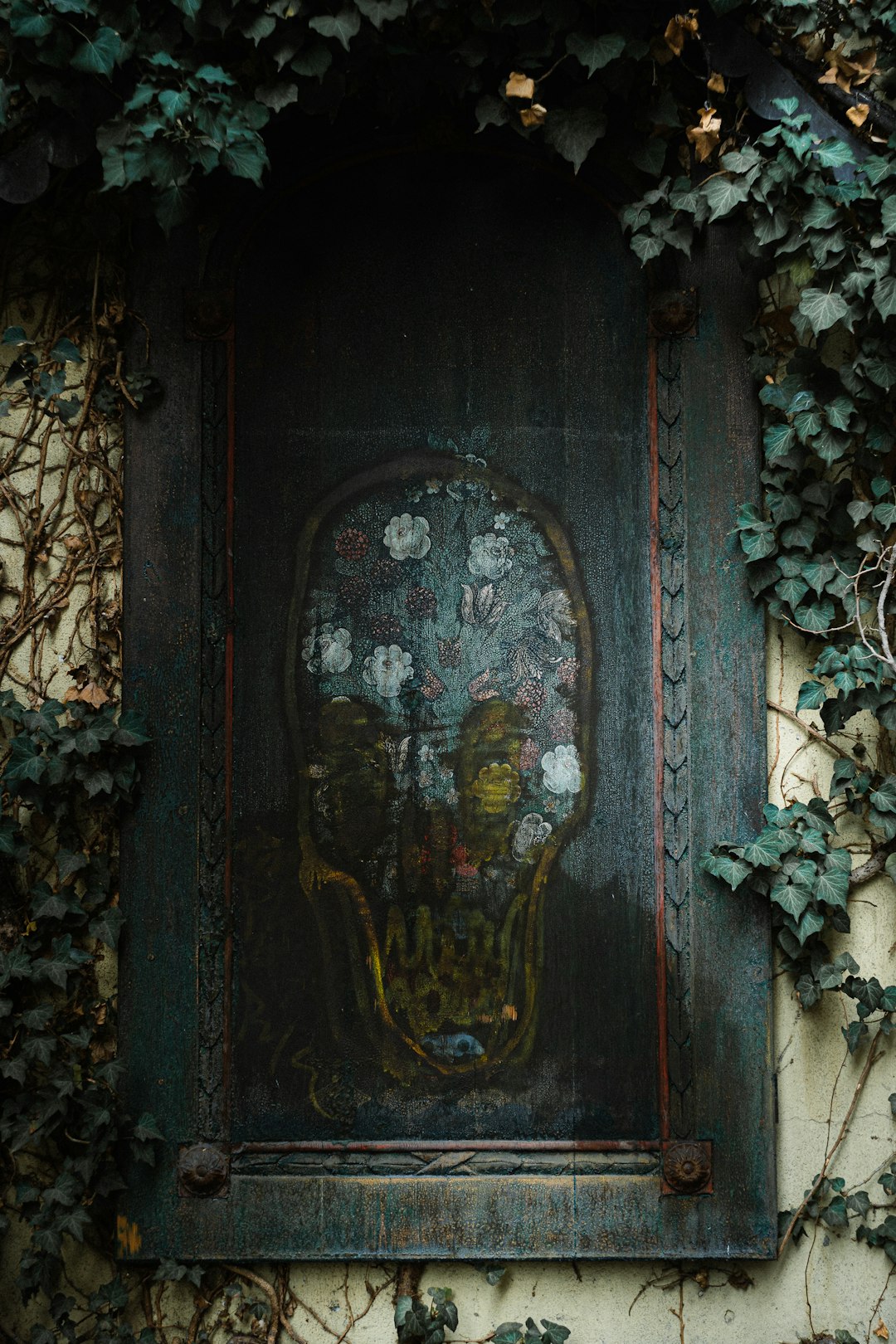 blue wooden door with gold and black door lever