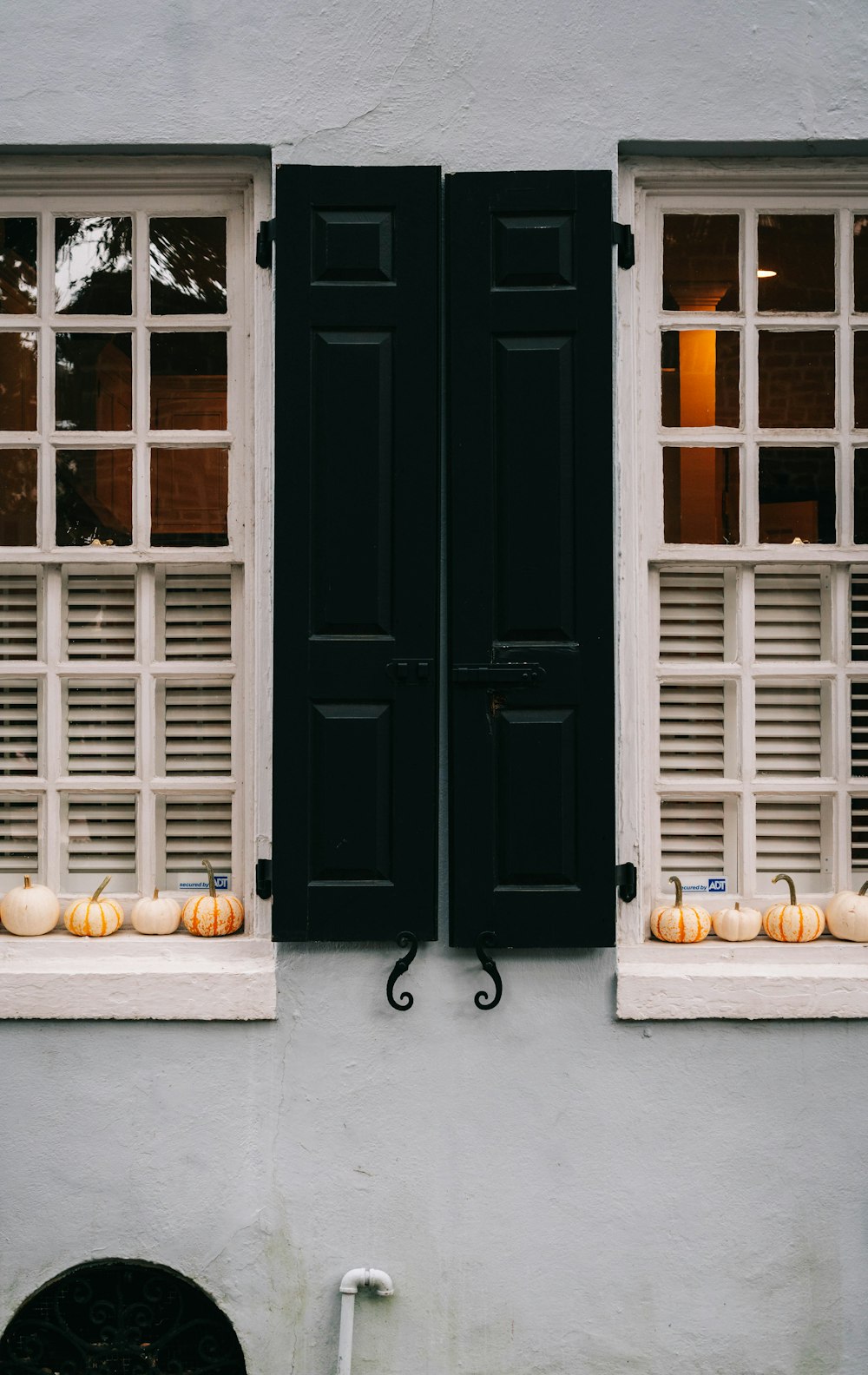 brown wooden door with white wooden frame