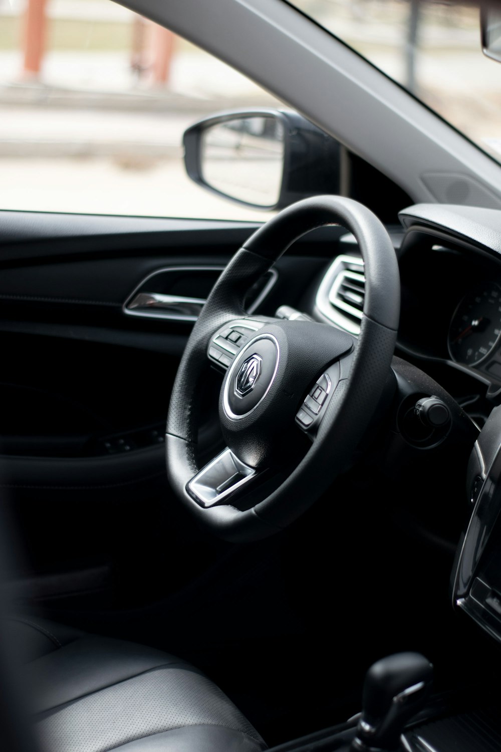 black and silver mercedes benz steering wheel