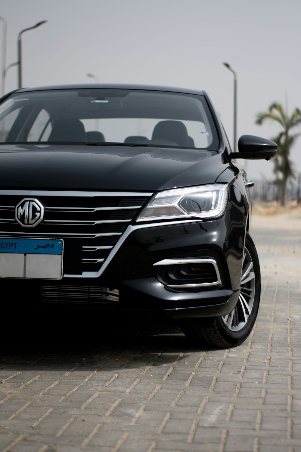 black mercedes benz c class on road during daytime