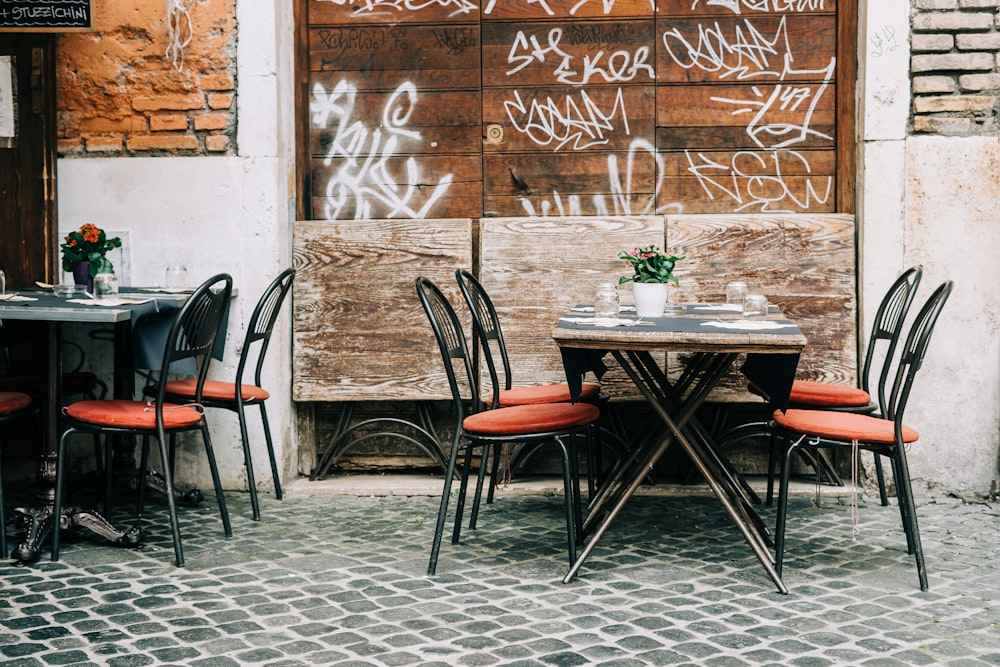 brown wooden table and chairs