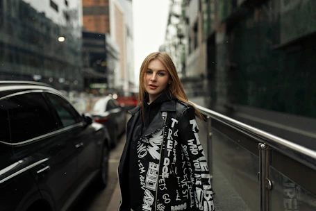 Urban young woman wearing stylish streetwear representing the 'secure' attachment style in a lively city setting